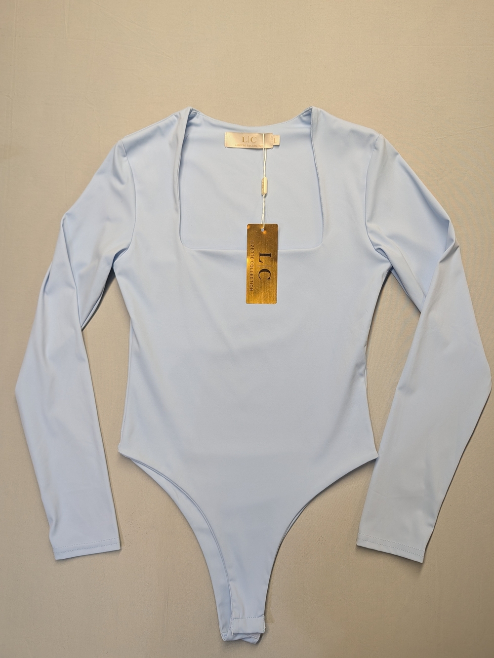 LC Lizette Collection Women's Sz L Blue Long Sleeve Square Neck Bodysuit Top